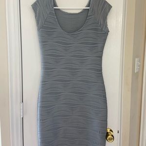 Taydey Ruched Sleeveless Knee Length Evening Dress